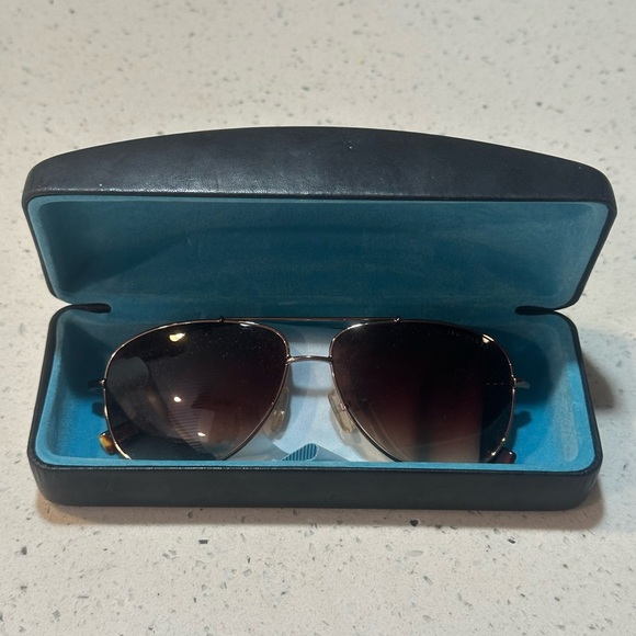 Ted Baker Dark Brown Sunglasses with floral detail sides. main image 12